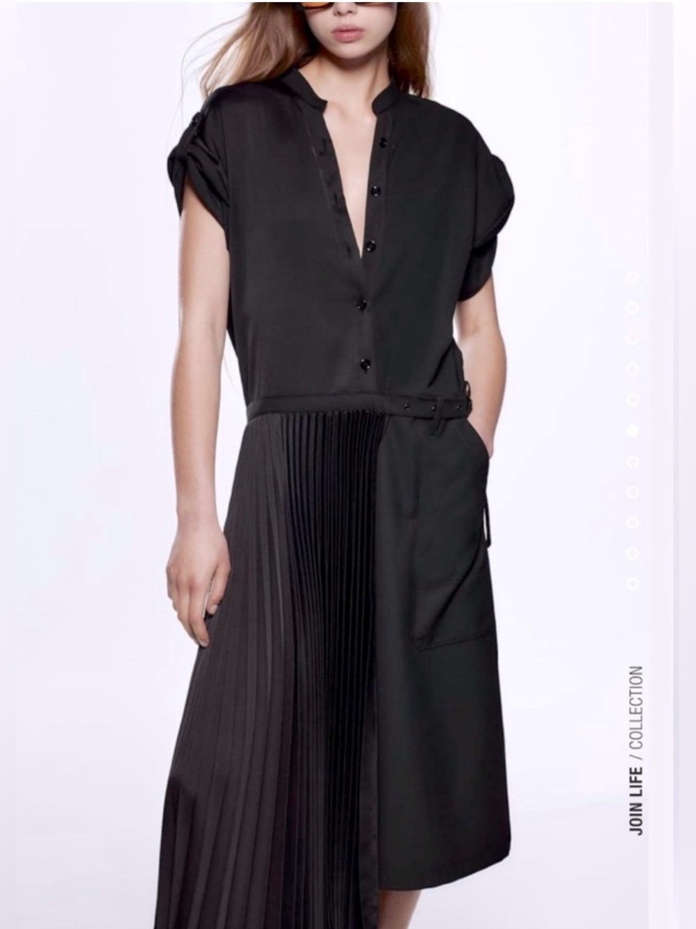 Zara Midi Dress with asymmetrical design with a pleated skirt and button front.